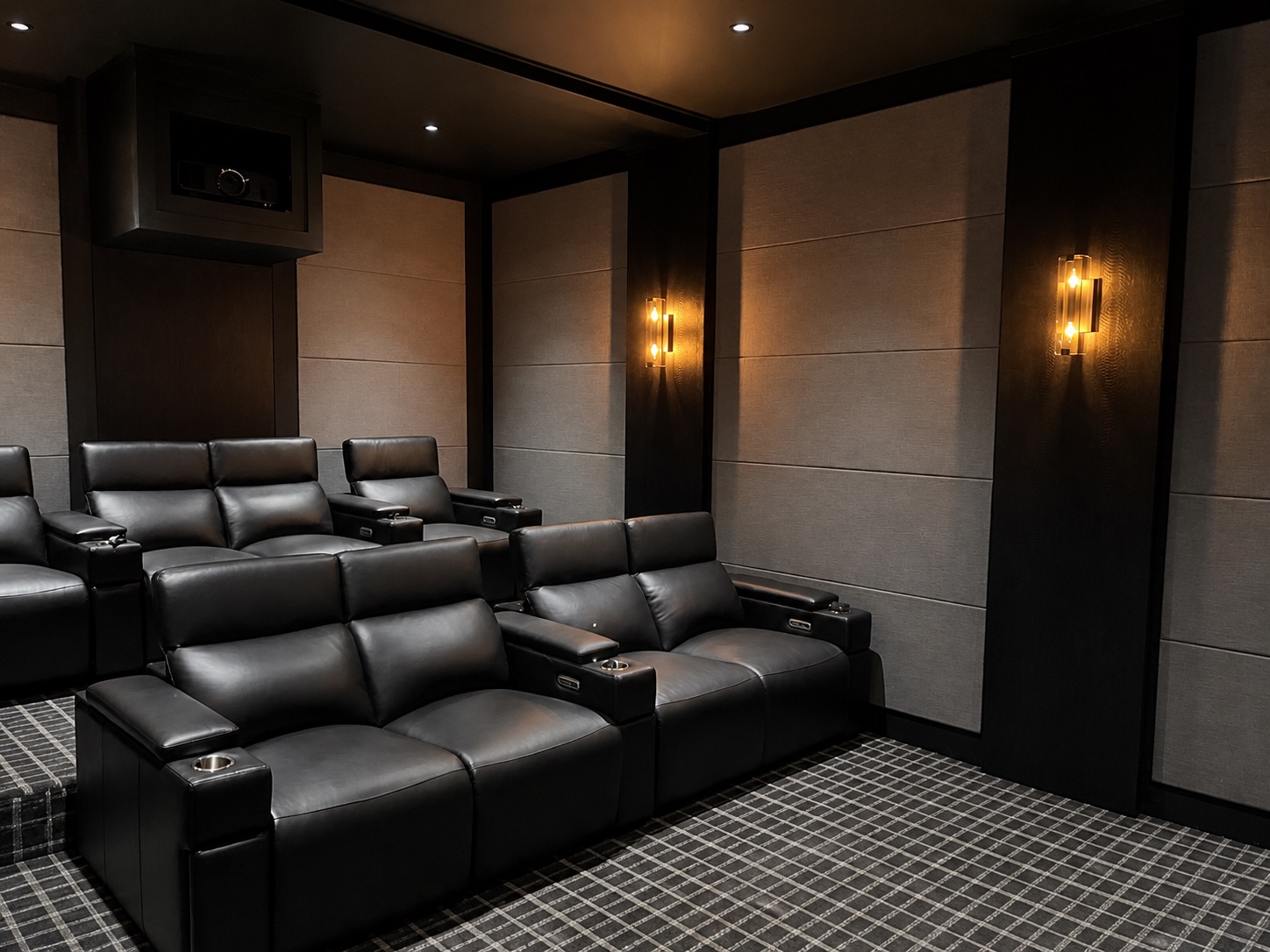 Warm architectural lighting illuminating the theater seating