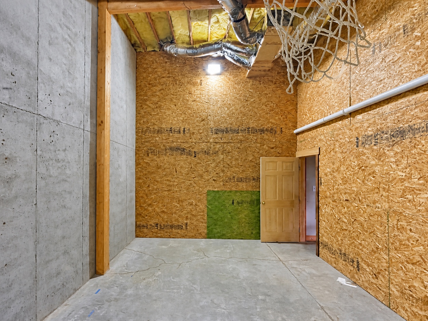 Original unfinished room before theater construction