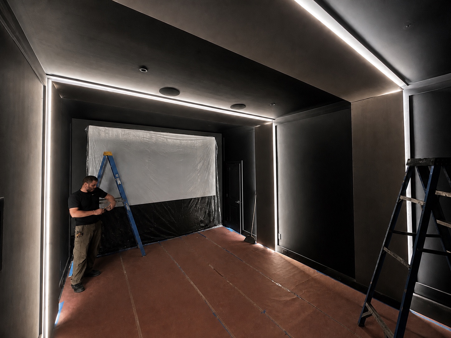 Linear lighting installation underway in the theater