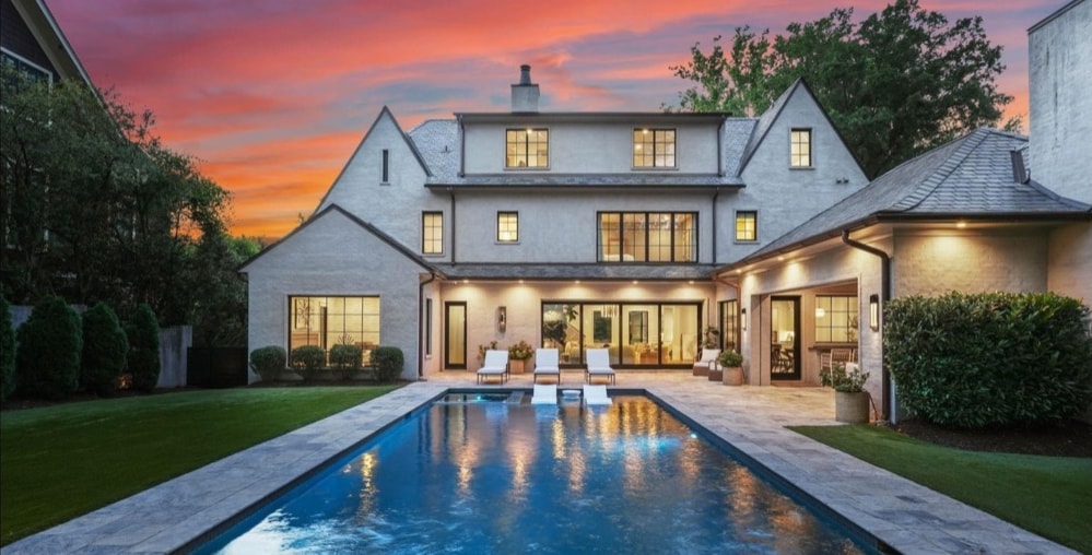 Eastover residence rear elevation and pool at twilight